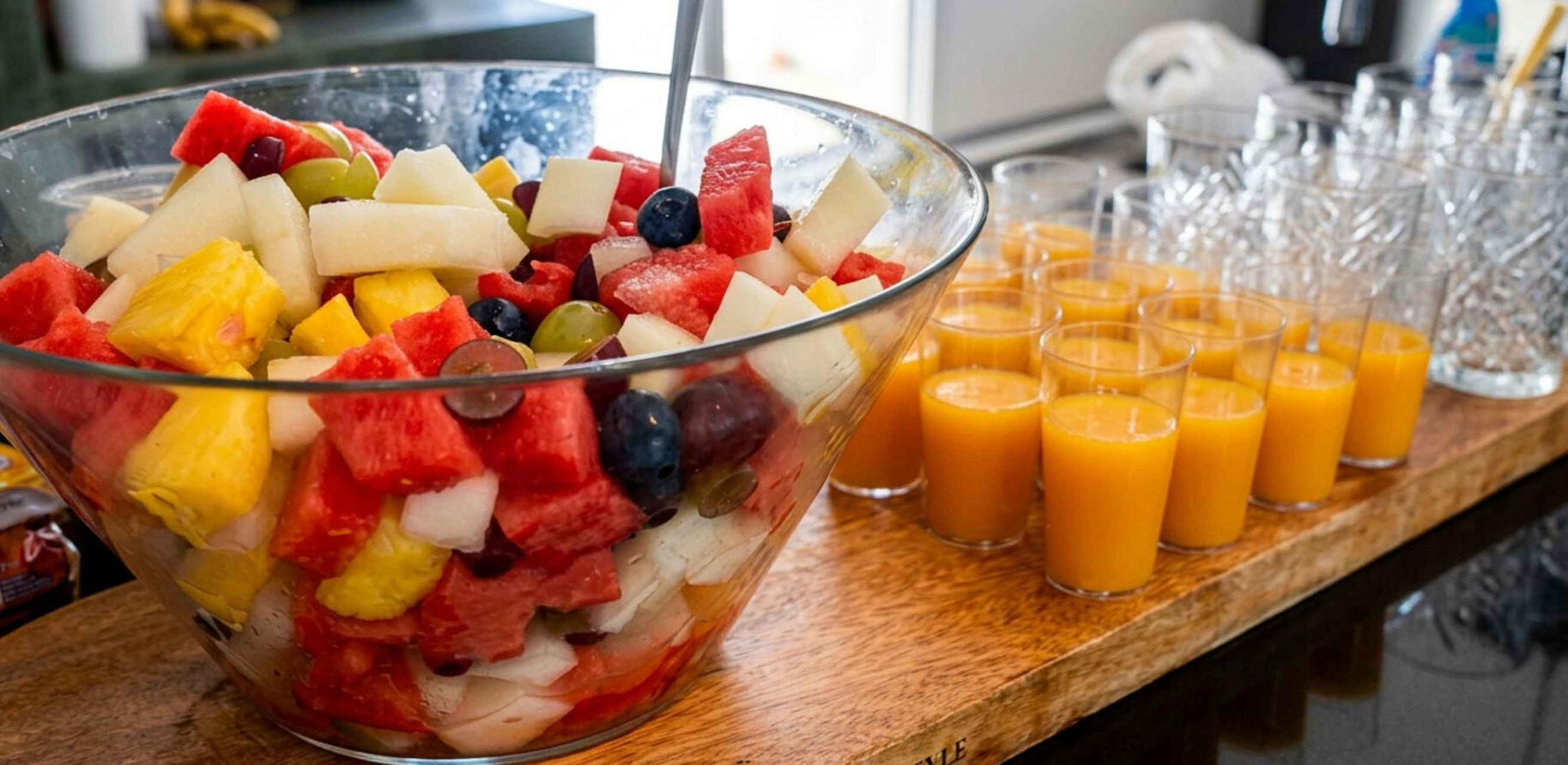 Fruit salad and ginger shots fruit salad and ginger shots elevate catering luxury villa breakfast