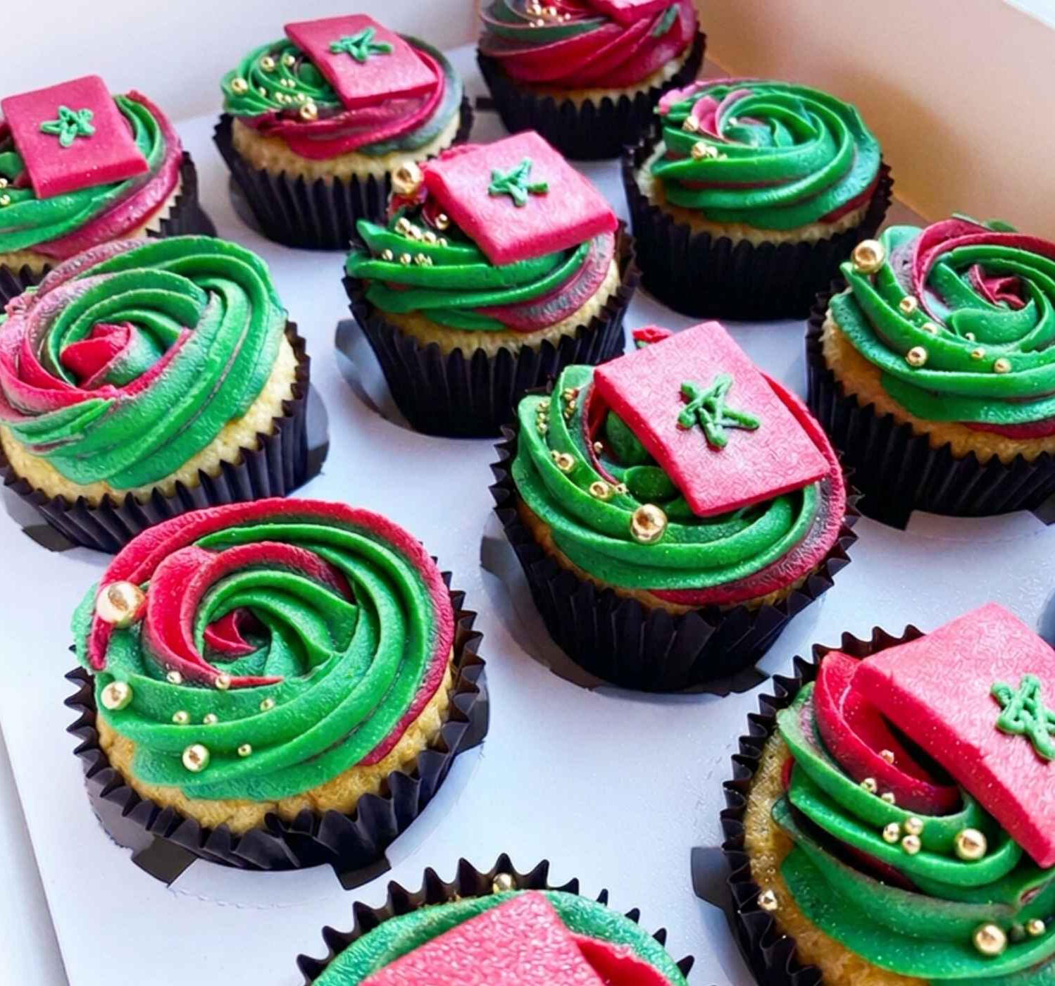 Pink and green buttercream cupcakes by Cupcake Tizzle
